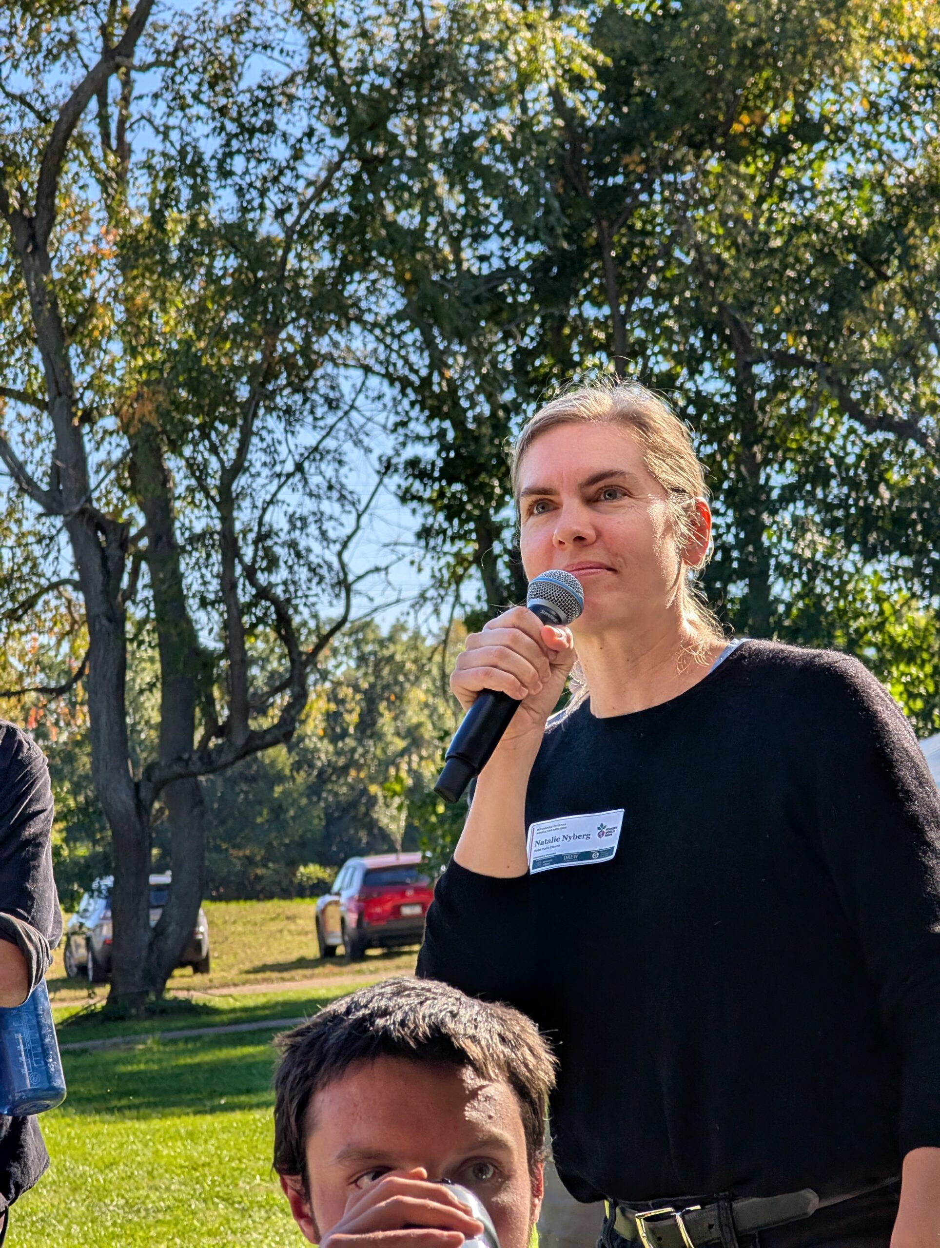 Natalie Nyberg speaking outdoors at SCAI 2026